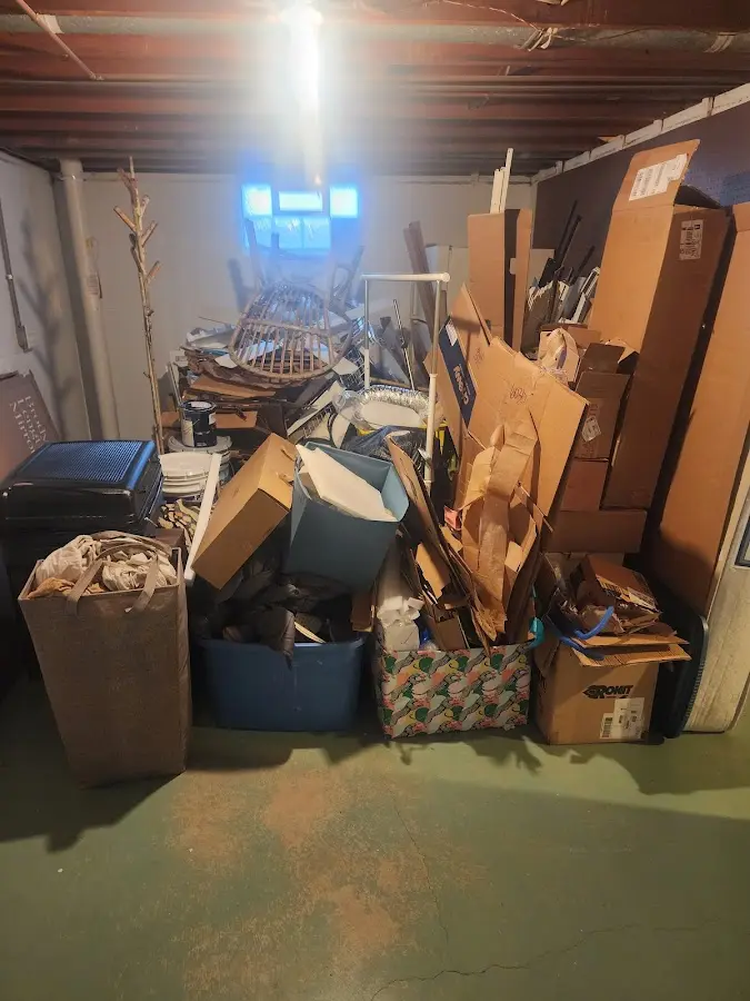 Roll-off dumpster container at job site for 4 Yard Dumpster Rental in Coopersville